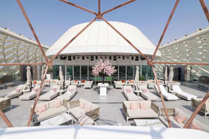 Daybeds and lounges on the Wet Deck by day
